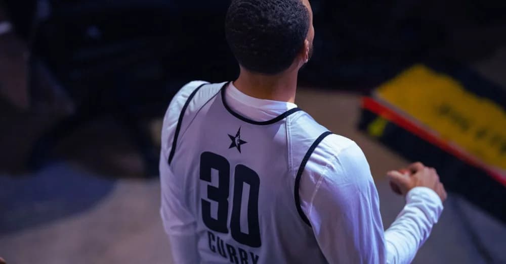 Steph Curry Celebrates Davidson College’s New Jerseys Featuring His Iconic Brand Logo