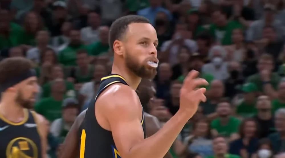 Stephen Curry Narrowly Avoids a Kiss from a Female Fan During Championship Parade in San Francisco