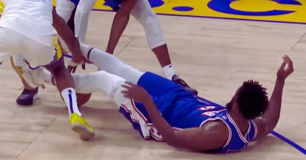 Embiid’s Struggles and Knee Injury Overshadow Sixers’ Defeat to Warriors